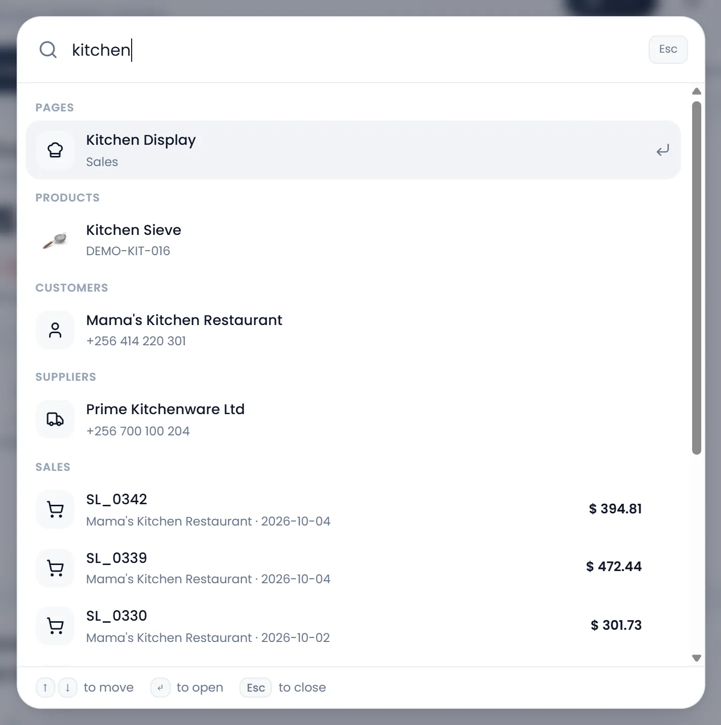 The search window with "kitchen" typed: one page, a product, a customer, a supplier, five sales and three purchases, each in its own group.
